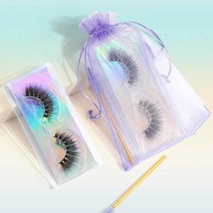Volumized false eyelashes with brush